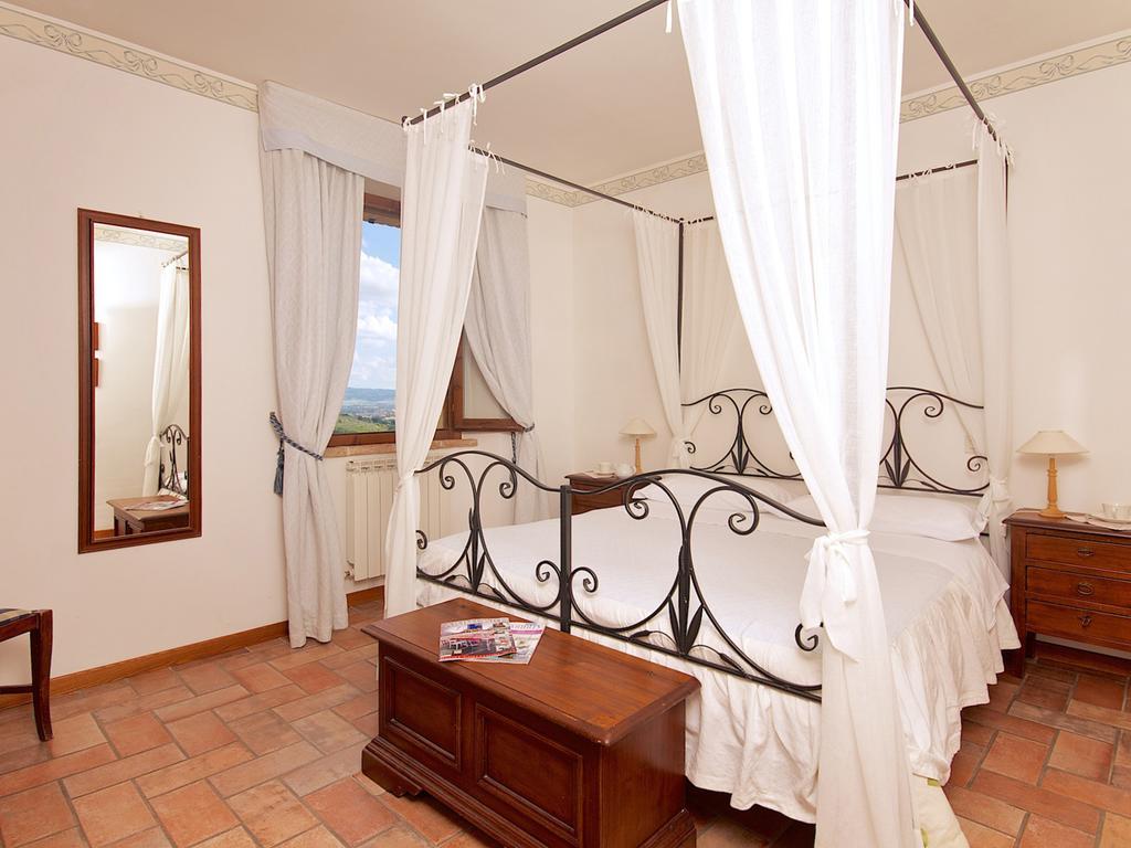 Agriturismo Le Colombe Asís Habitación foto